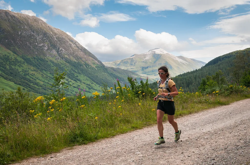 Trail runner demonstrating the single leg landing control assessed in ankle hop testing